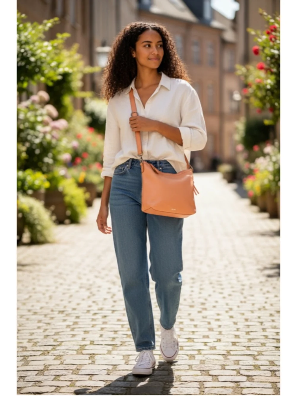 The Sak Jasmine orange leather hobo crossbody bag